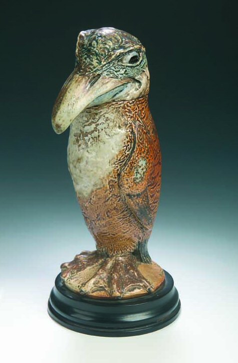 A Martin Brother's stoneware bird jar and cover,