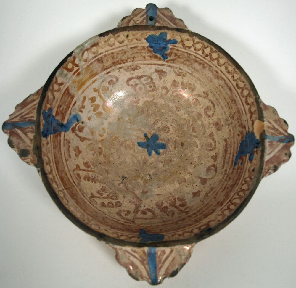 A large 15th century Hispano Moresque maiolica scudella