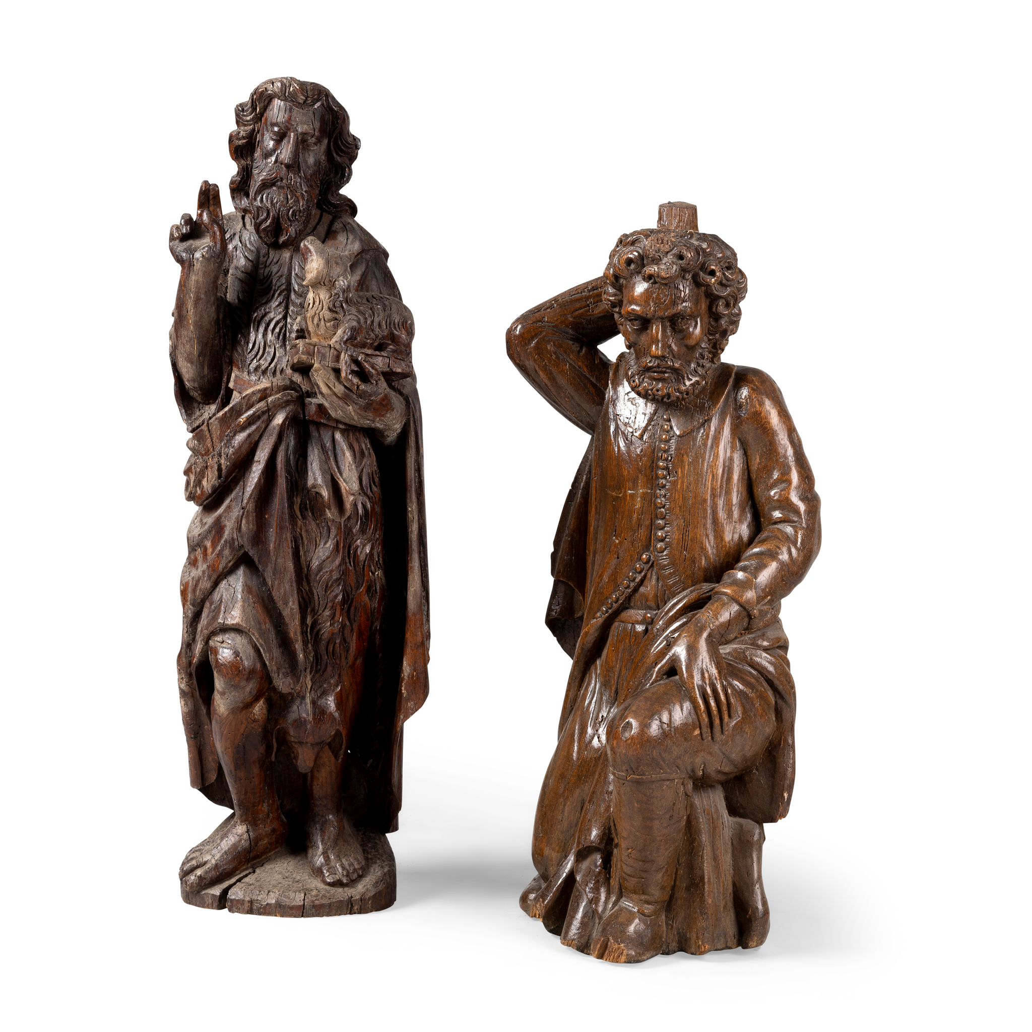 A CARVED OAK FIGURE OF JOHN THE BAPTIST