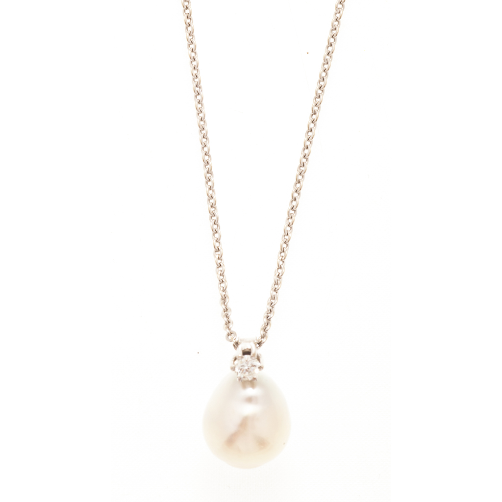 A pearl and diamond set pendant
