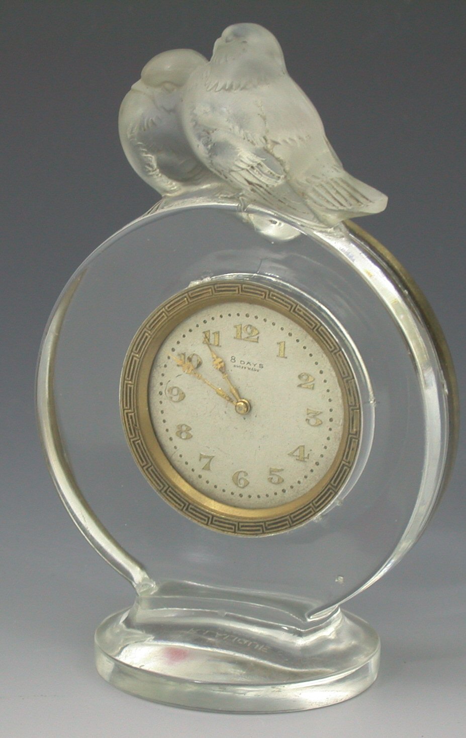 'Pierrots', a Lalique clear and frosted glass clock,