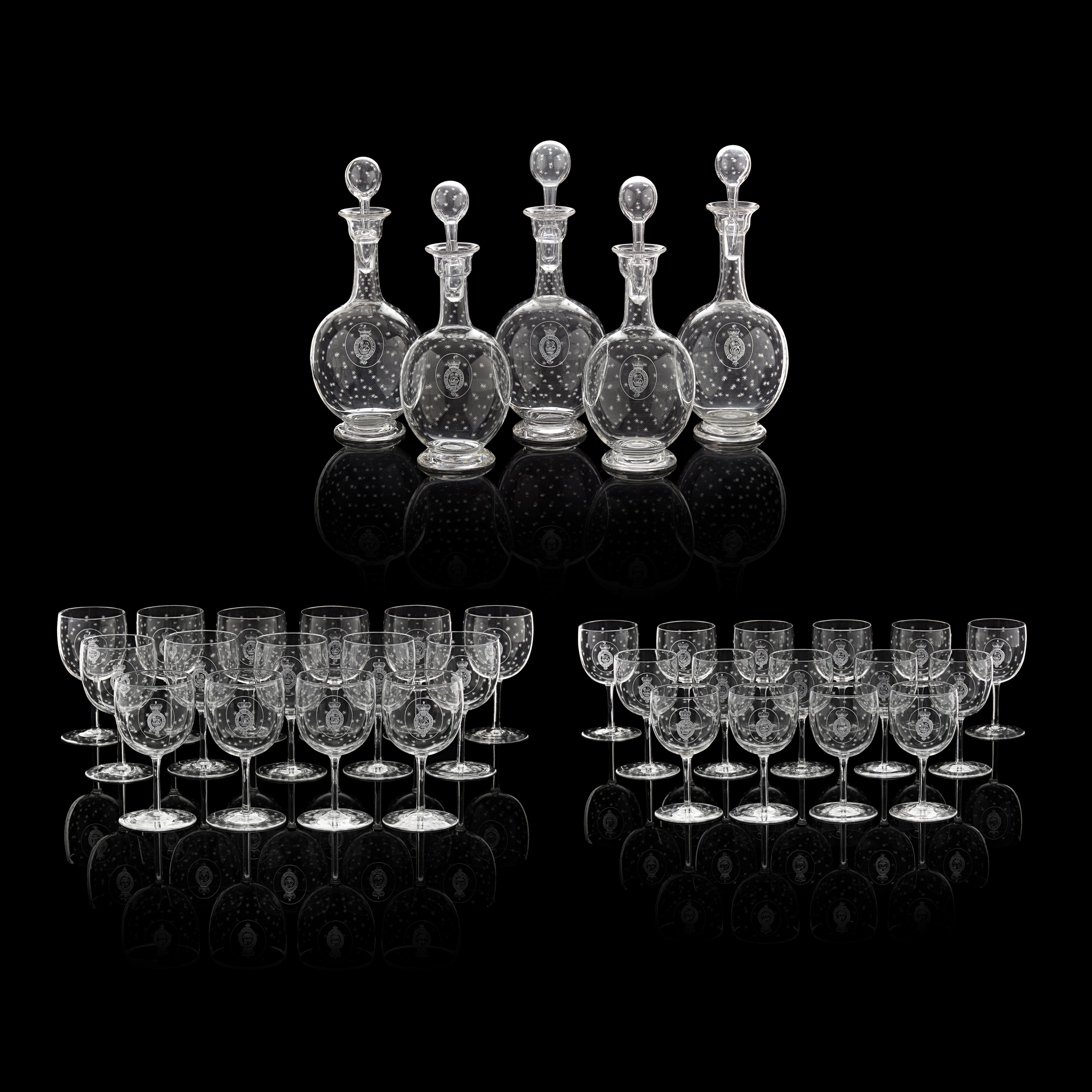 SUITE OF ENGRAVED GLASS AND DECANTERS, OF ROYAL / QUEEN VICTORIA INTEREST