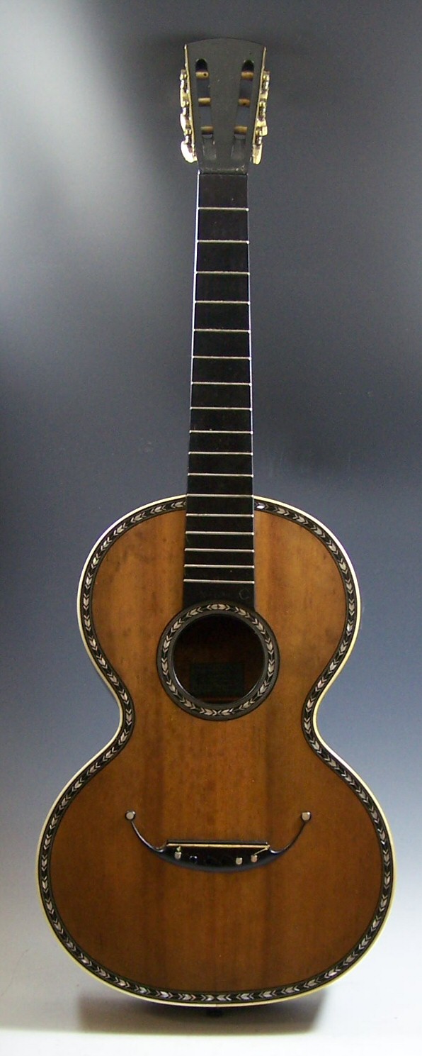 An early 19th century classical guitar and case
