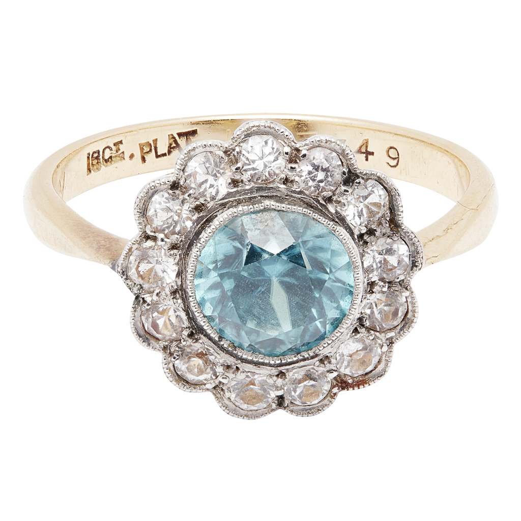 A blue zircon and diamond set cluster ring