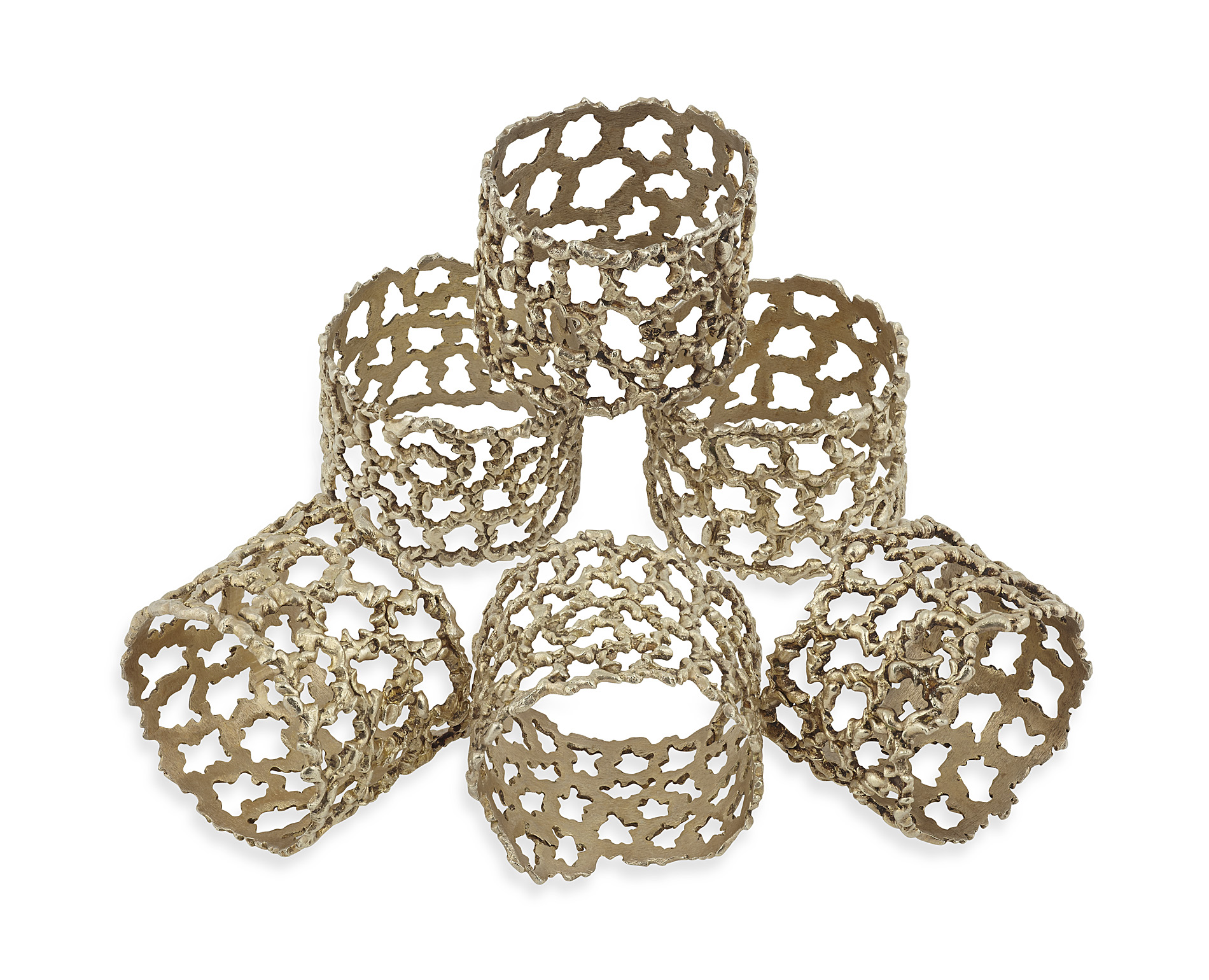STUART DEVLIN - A set of six modern silver gilt napkin rings