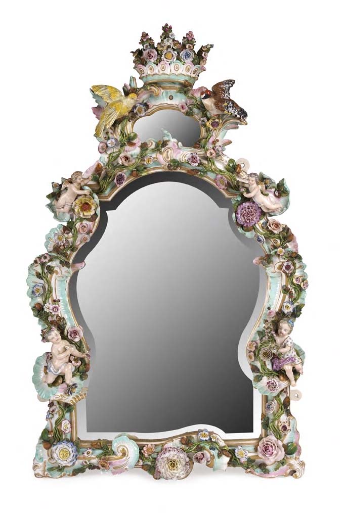 A 19th century German porcelain framed mirror,