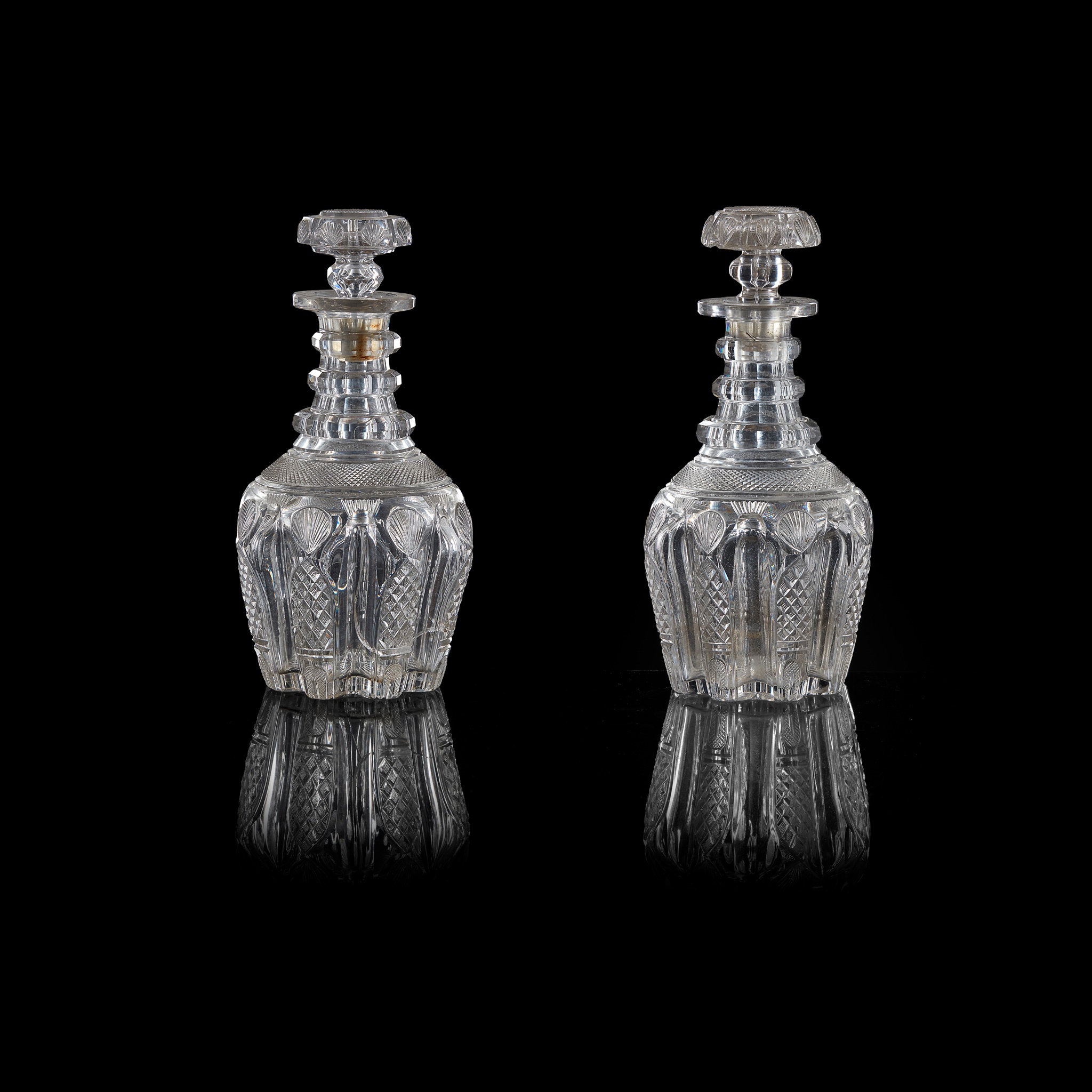 PAIR OF FULL BOTTLE TRIPLE NECK RING DECANTERS AND A MATCHING HALF BOTTLE DECANTER