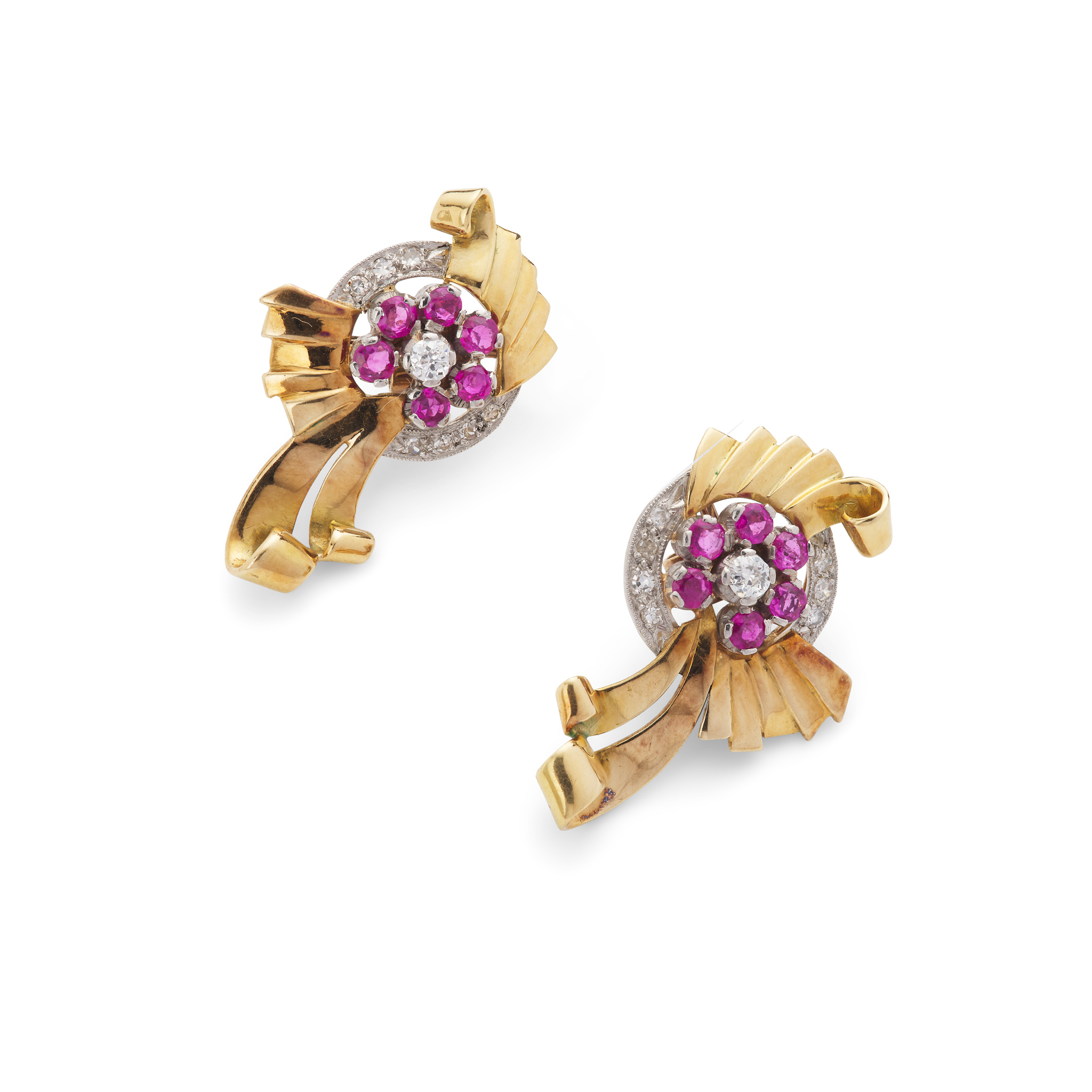 A pair of scrollwork ruby and diamond earrings, circa 1950