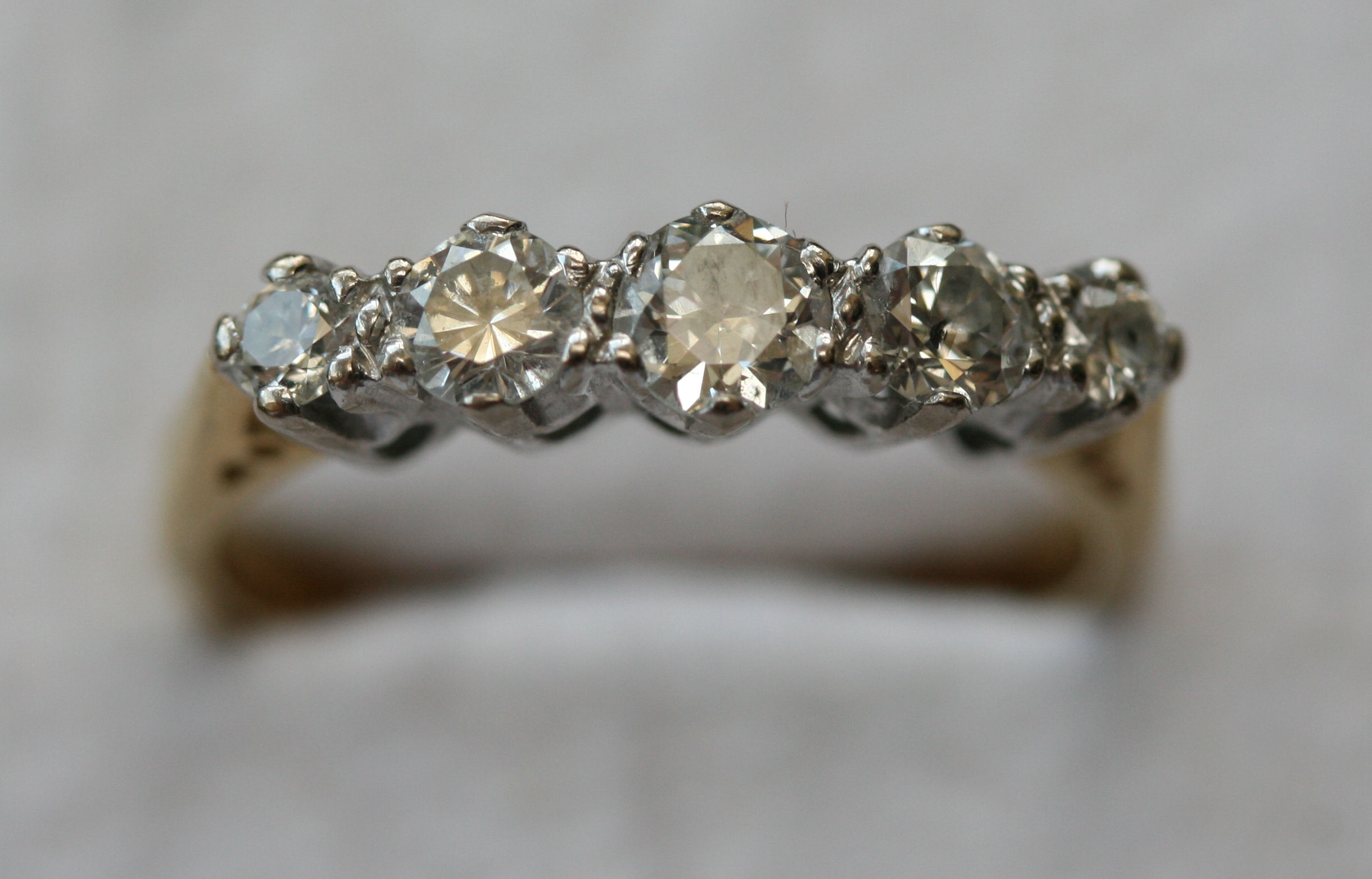 An 18ct gold mounted diamond five-stone ring