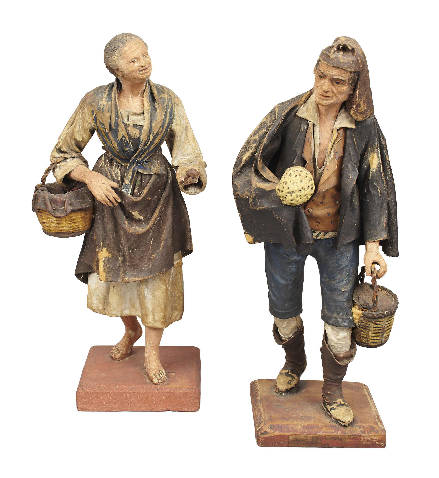 TWO NEOPOLITAN POLYCHROME, CARVED WOOD AND COMPOSITE CRECHE FIGURES