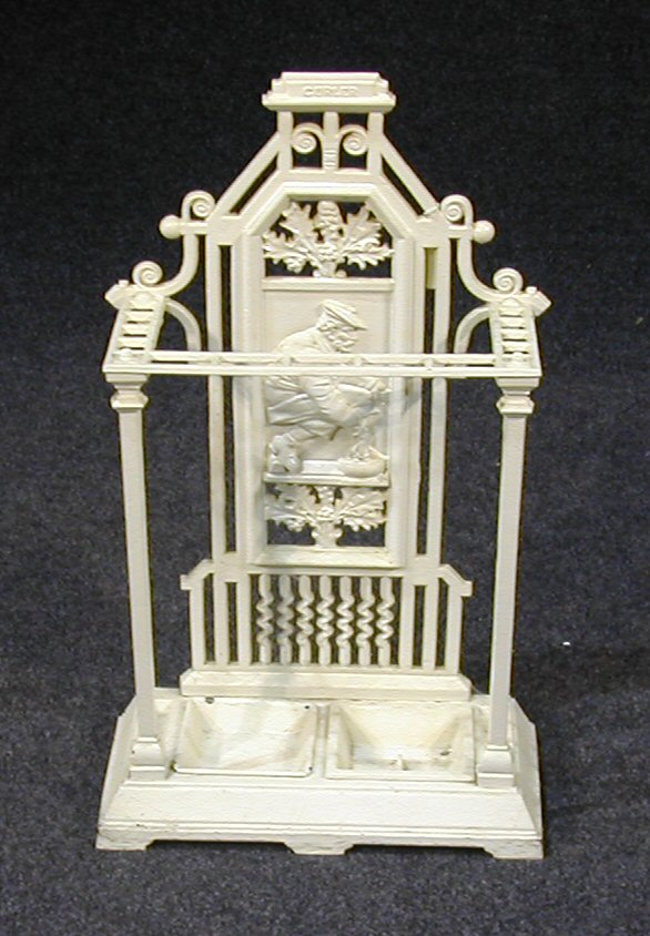 A Victorian white painted cast iron stick stand,