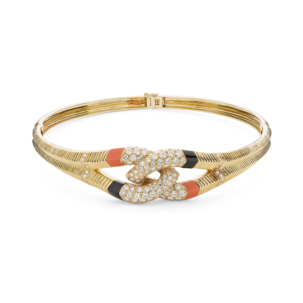 A diamond, coral and onyx set collar