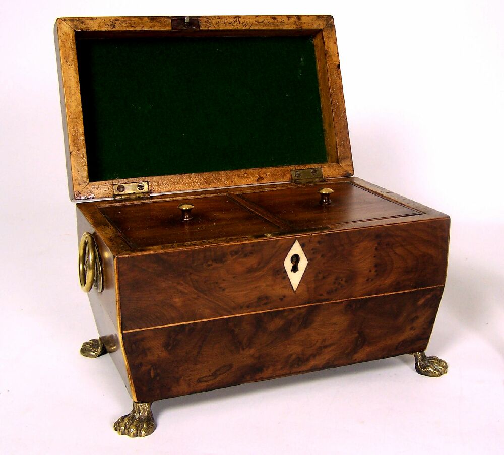 A Regency burr yewwood tea caddy