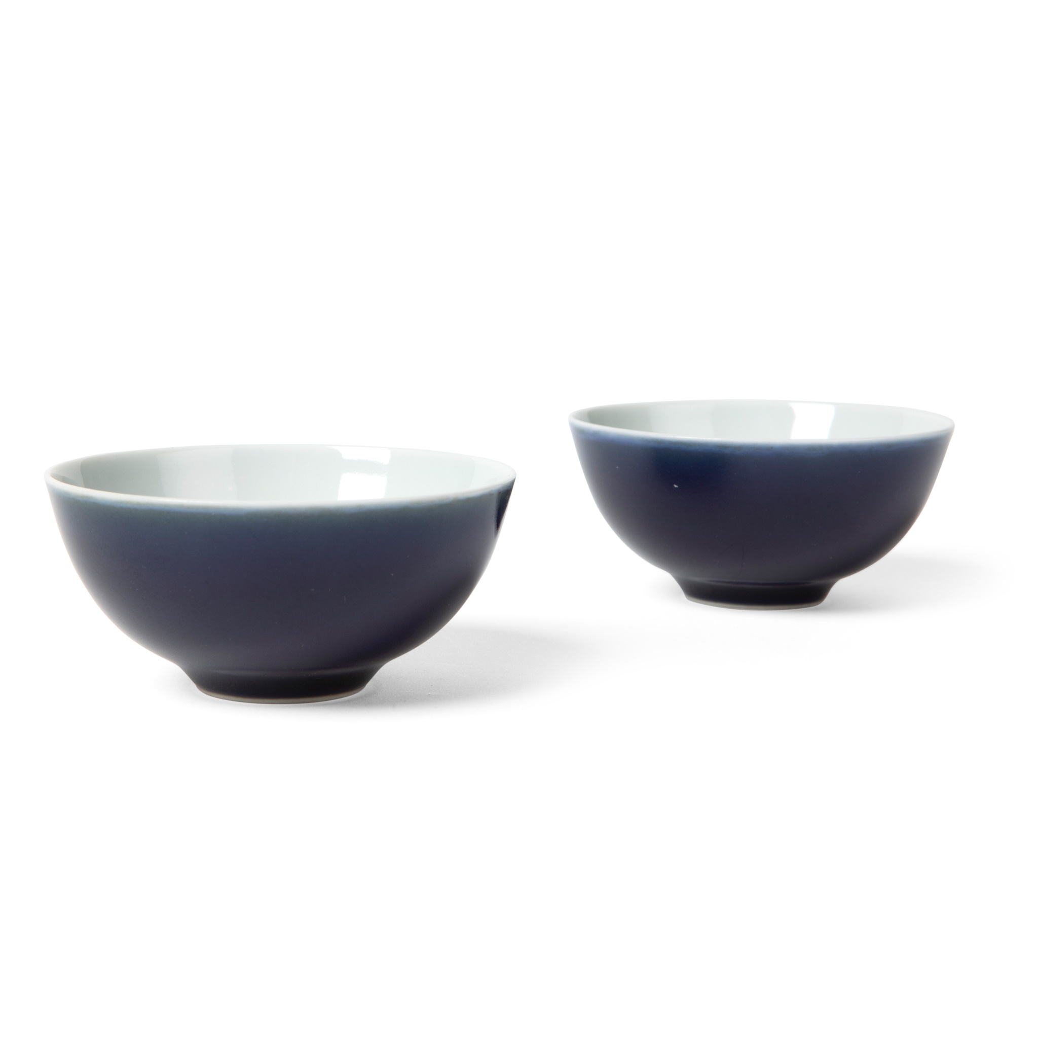 PAIR OF BLUE-GLAZED CUPS