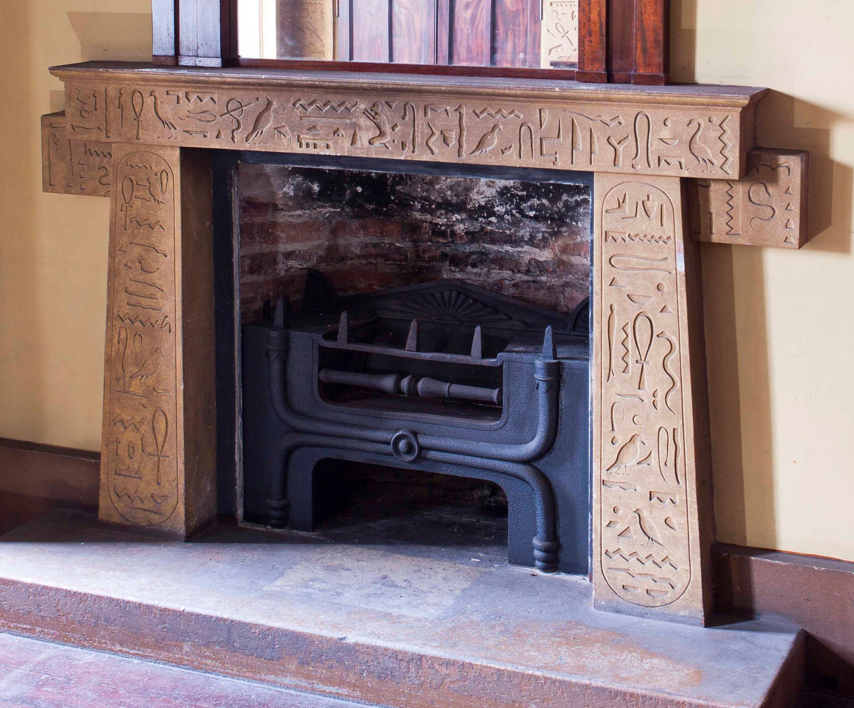 REGENCY EGYPTIAN REVIVAL CAST IRON FIRE GRATE