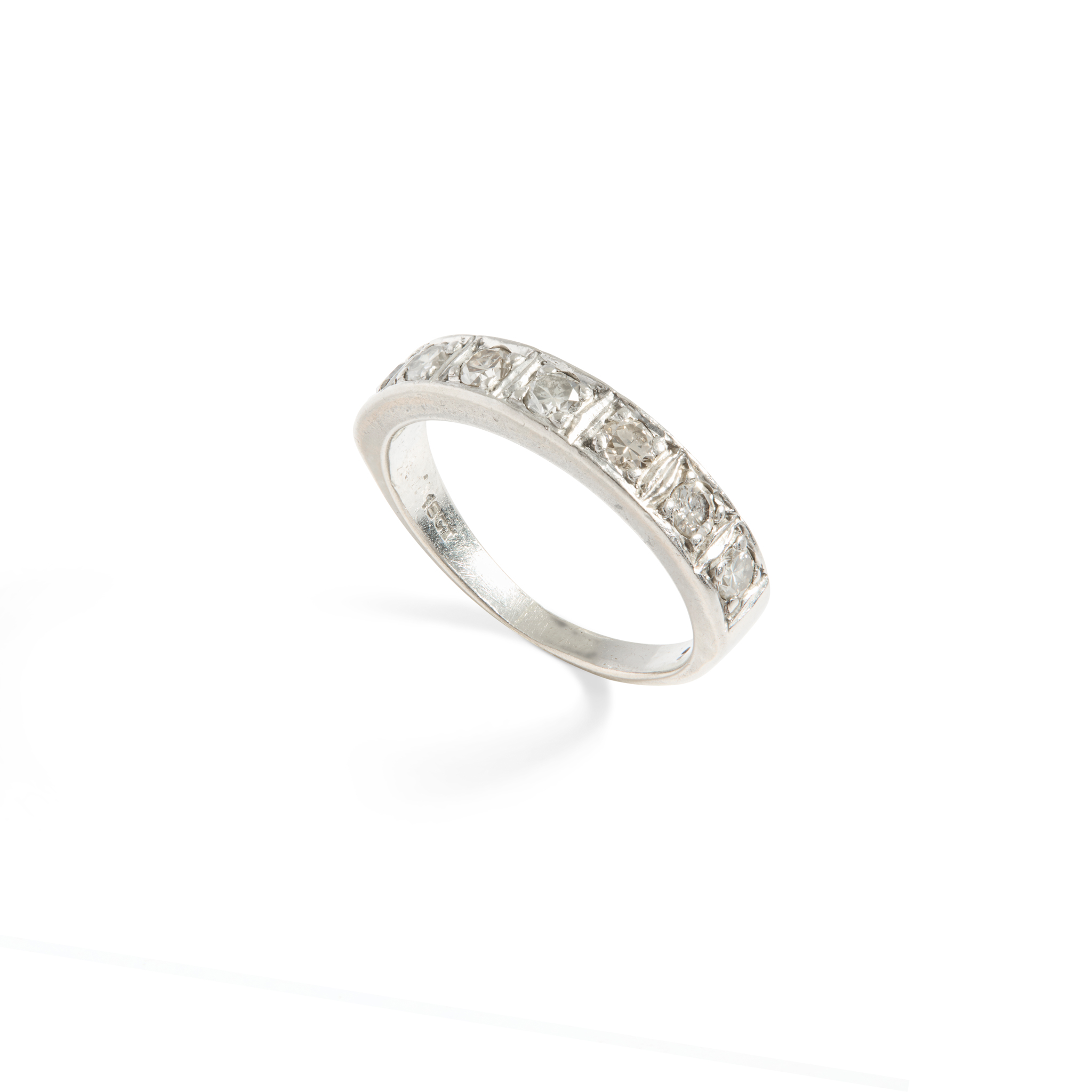 A diamond half-eternity ring
