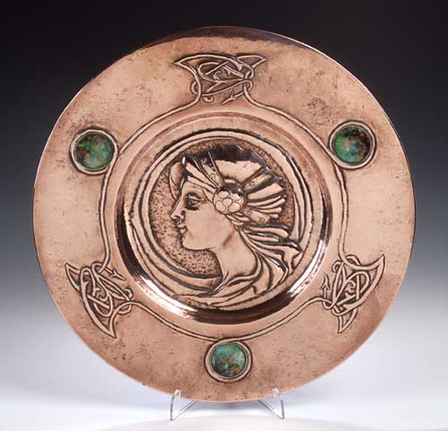 A Scottish Arts and Crafts copper charger,