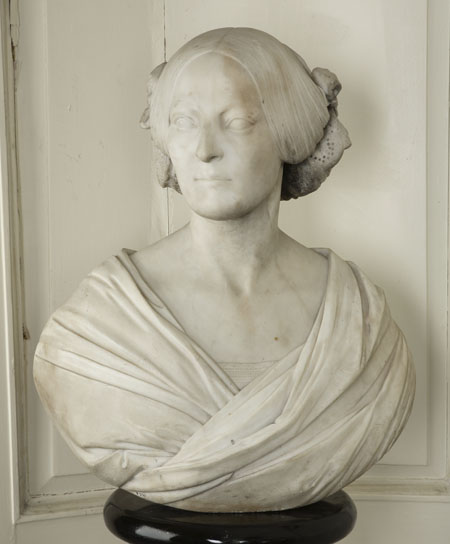 A 19th century white marble bust of a woman