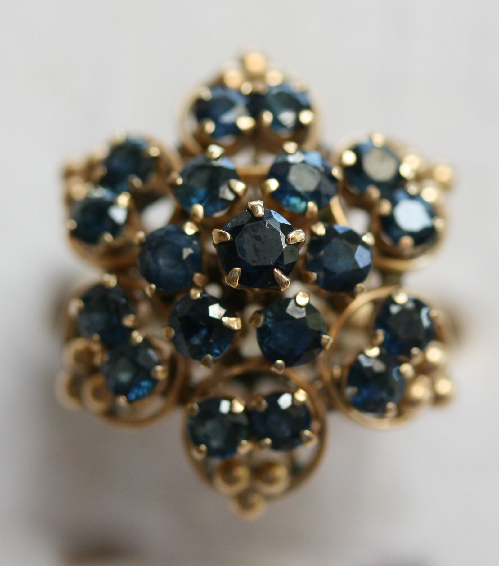 A group of five various gold and gem set rings