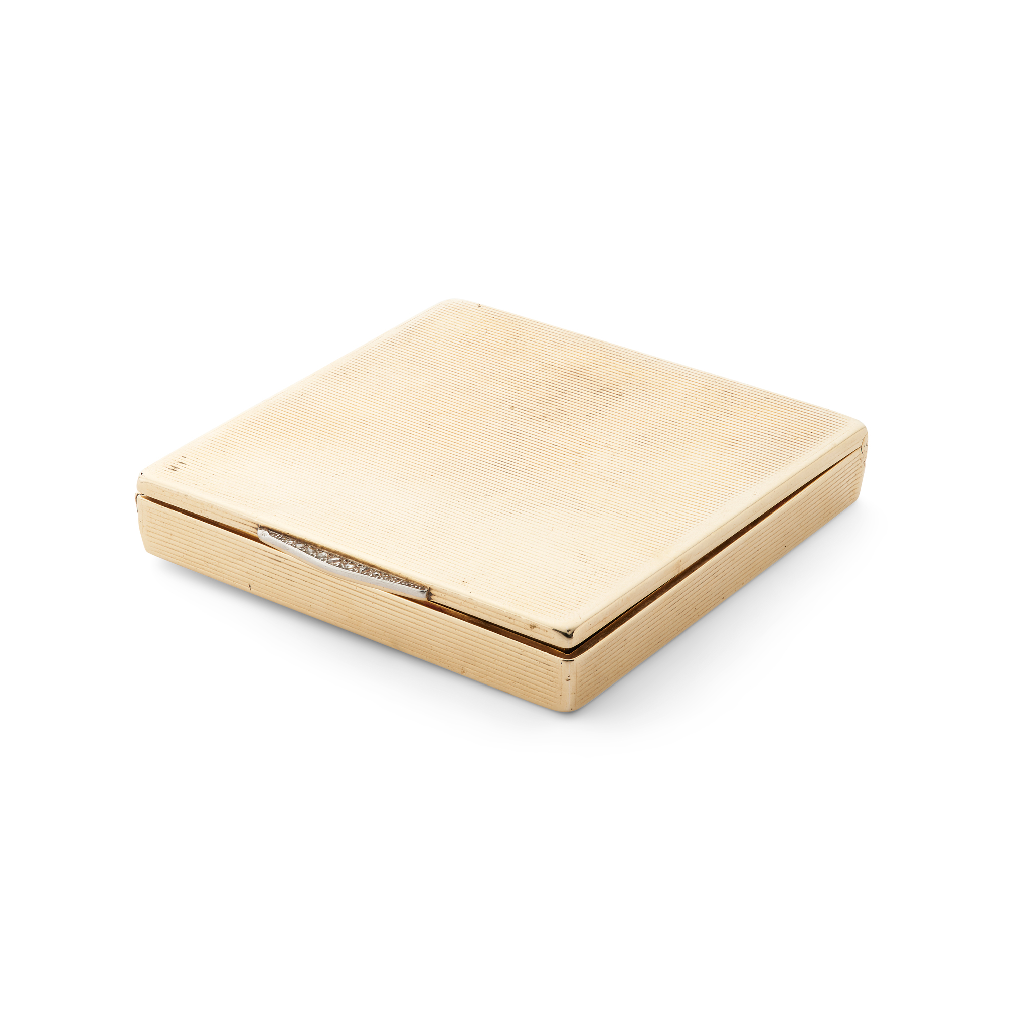 Cartier: A 9ct gold diamond compact, circa 1950s
