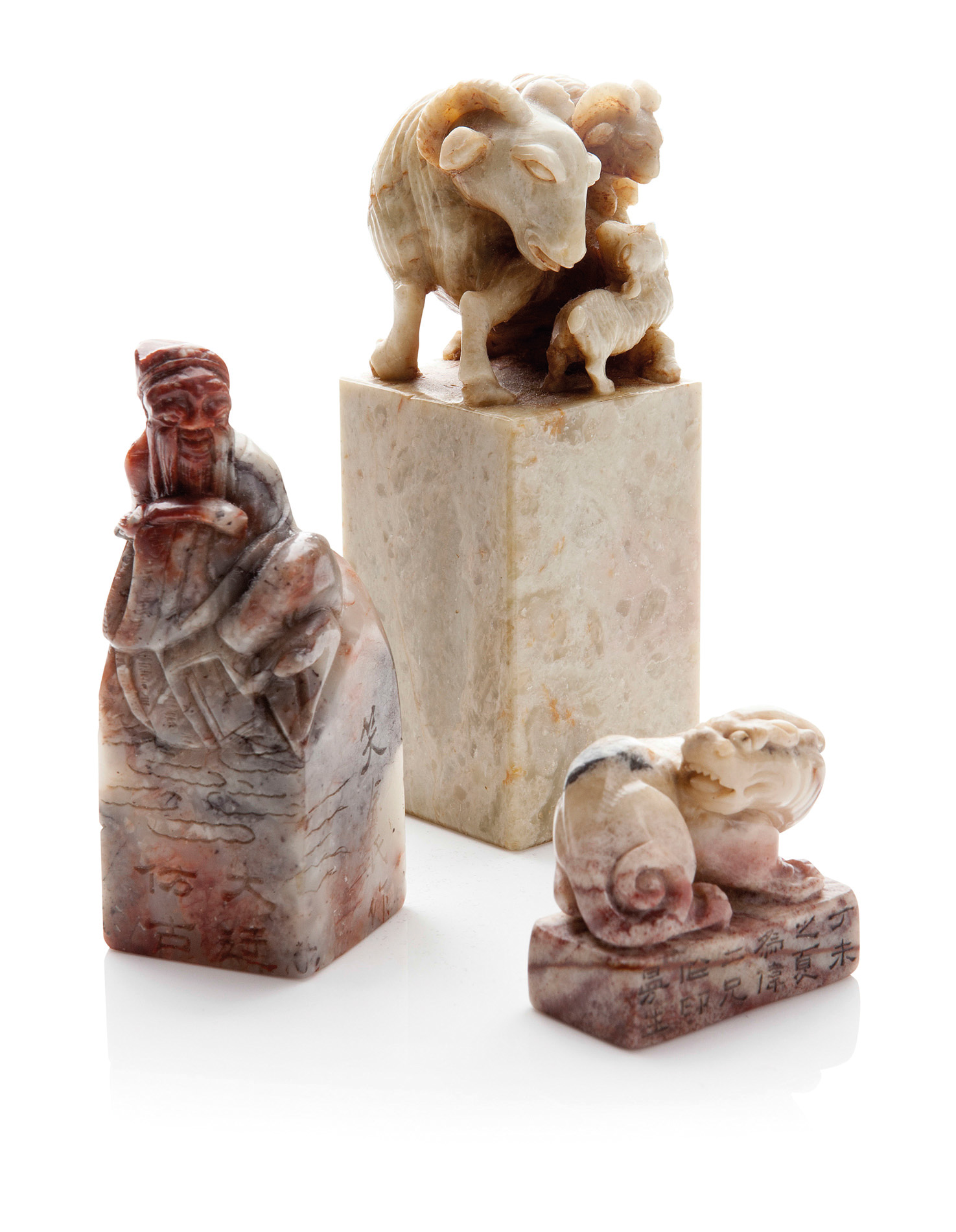 COLLECTION OF SIX SOAPSTONE AND BRONZE SEALS