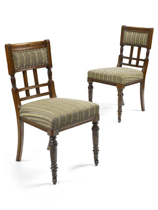 A set of eight Aesthetic Movement walnut dining chairs, in the manner of Thomas Jekyll Stamped Maple & Co. Ltd (London)