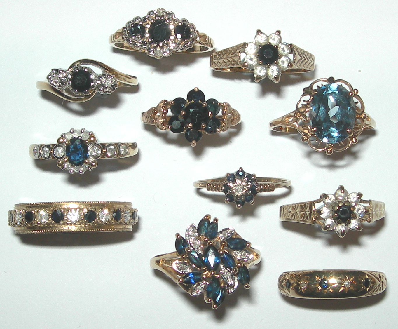 A collection of eleven assorted gem set rings,
