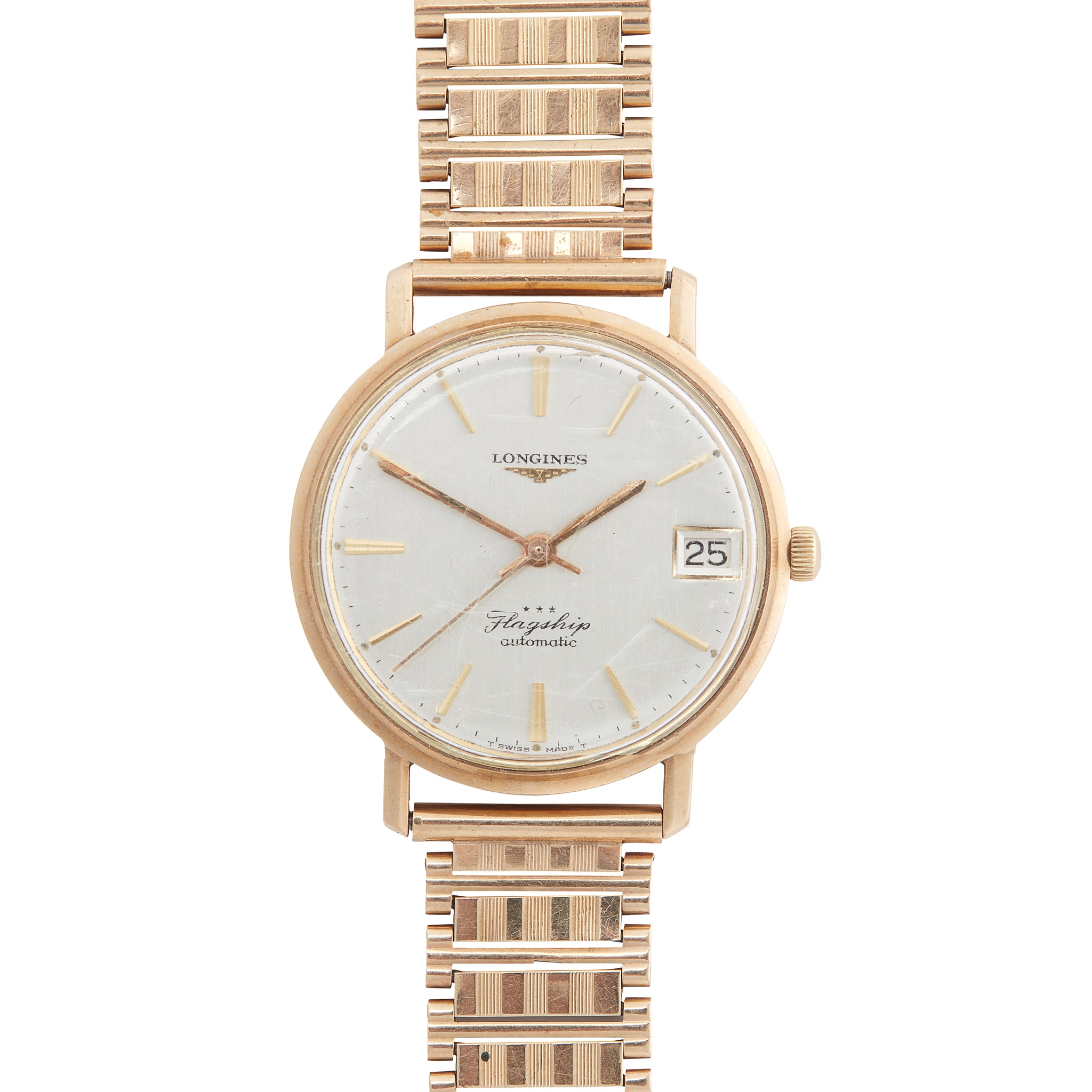 Longines: A 9ct gold wrist watch
