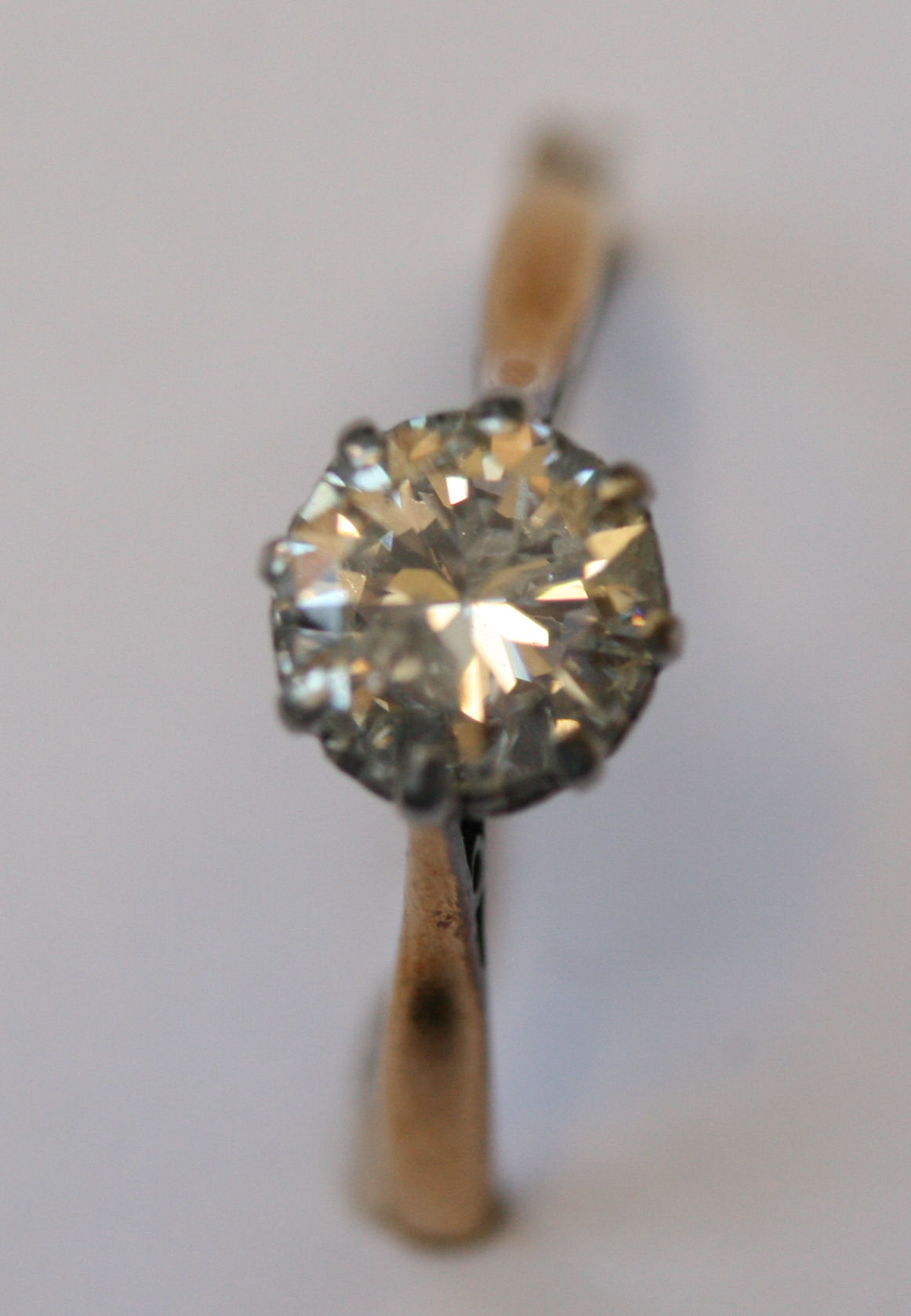 An 18ct gold and platinum mounted diamond single-stone ring