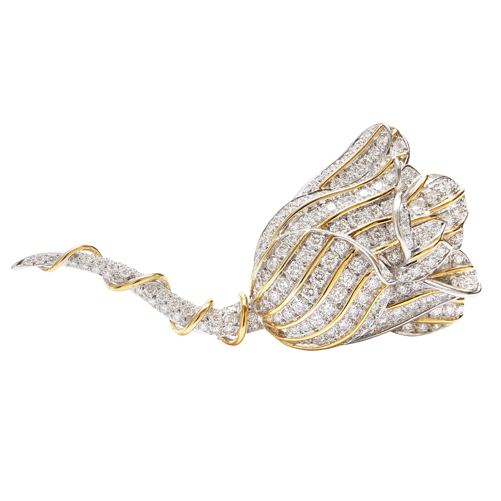 A diamond set rose brooch