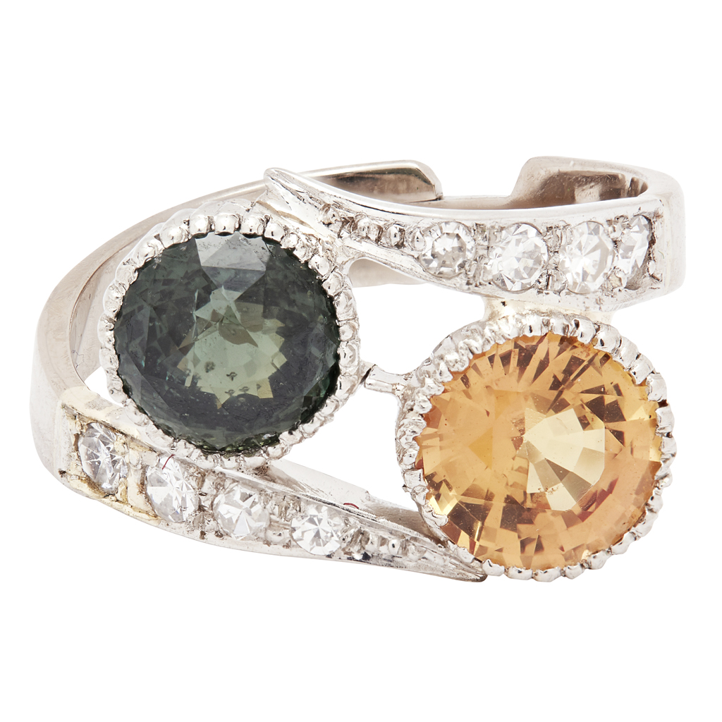 A yellow and green sapphire set ring
