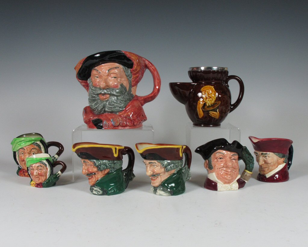 A group of Royal Doulton character jugs