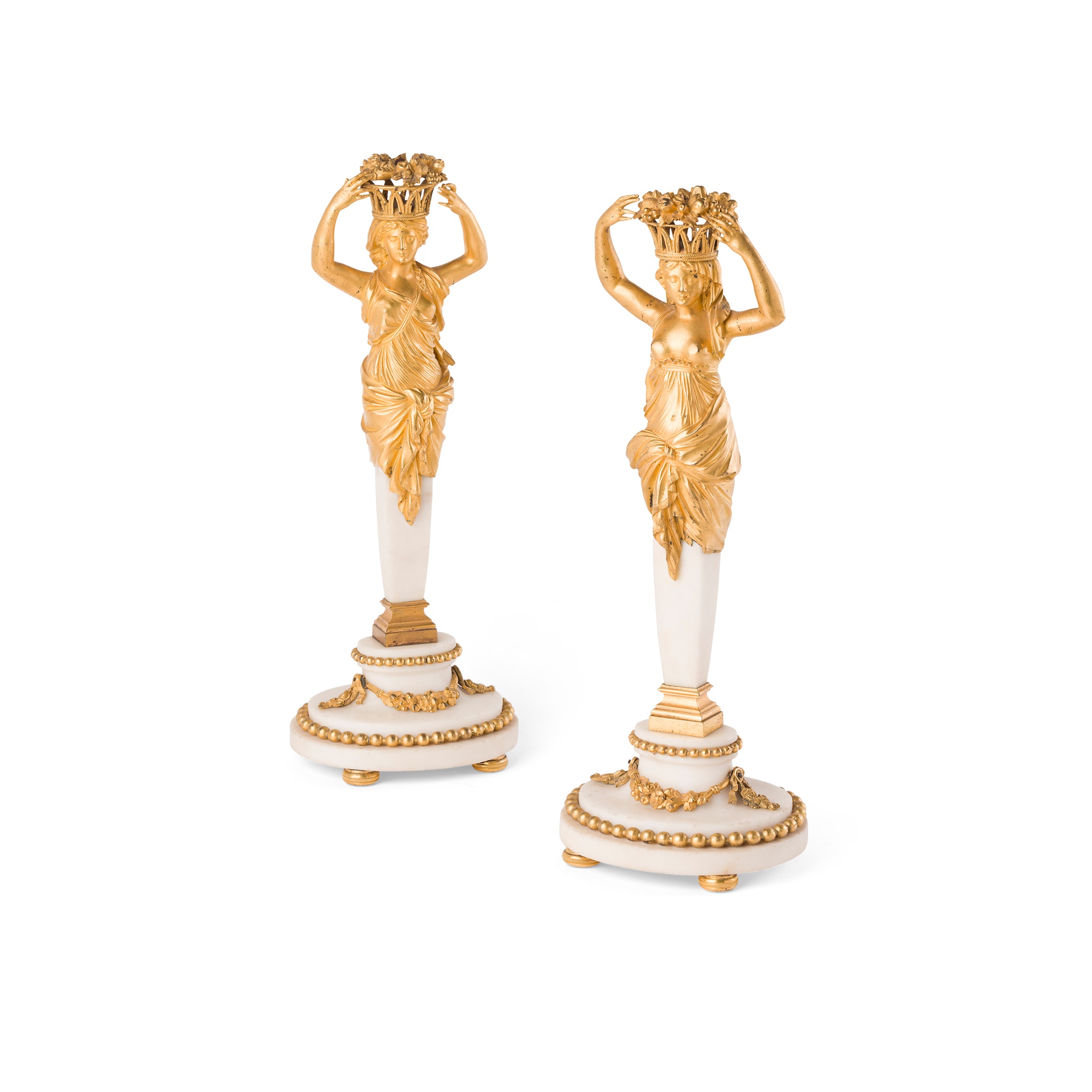 PAIR OF FRENCH EMPIRE GILT BRONZE AND WHITE MARBLE FIGURAL CANDLESTICKS