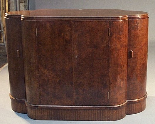 A walnut veneered cocktail cabinet
