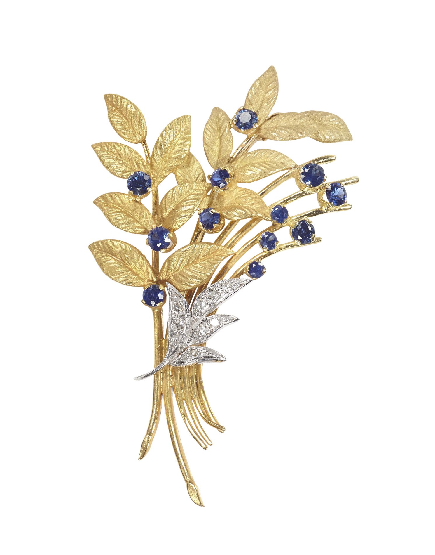 An 18ct gold mounted sapphire and diamond set foliate spray brooch
