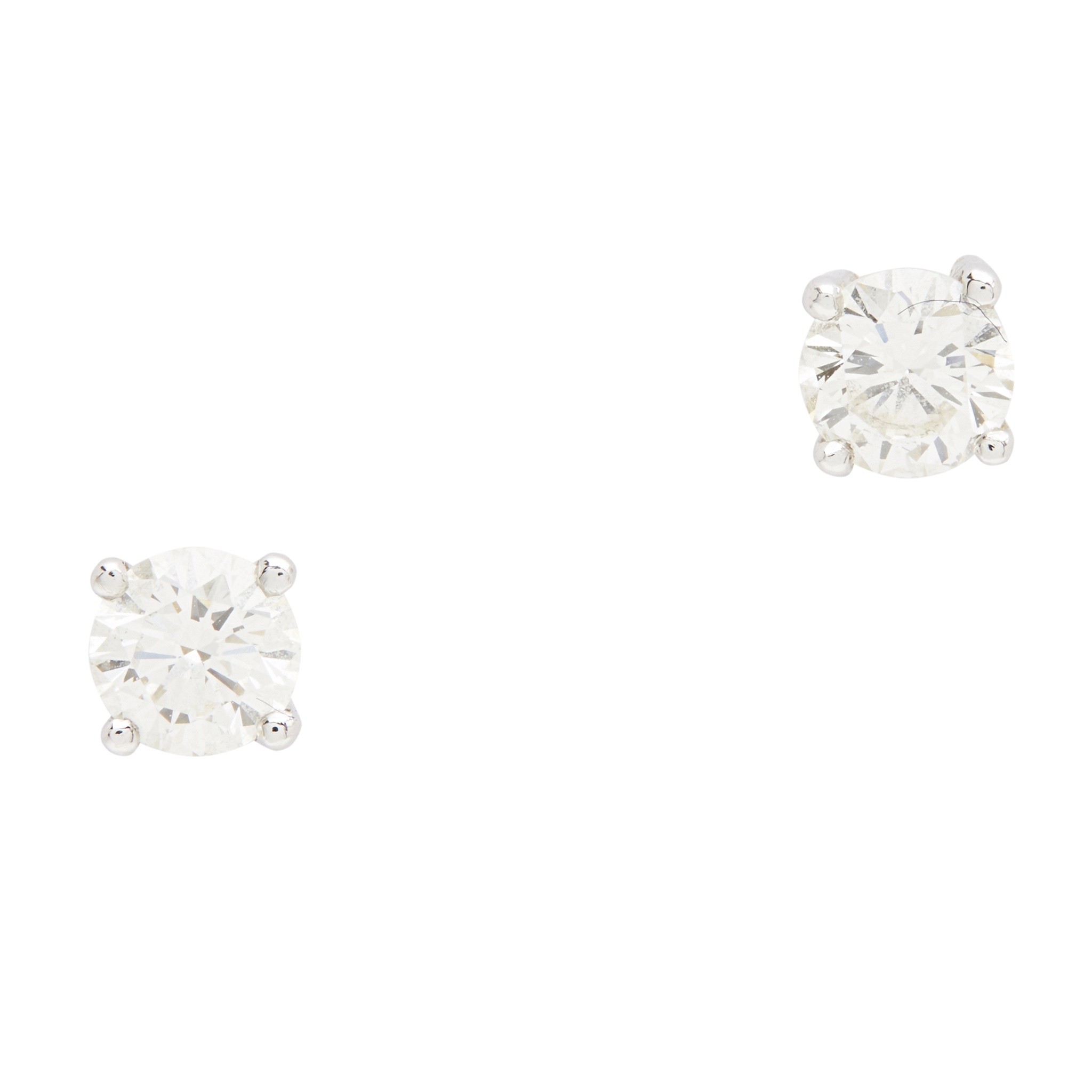 A pair of diamond set stud earrings