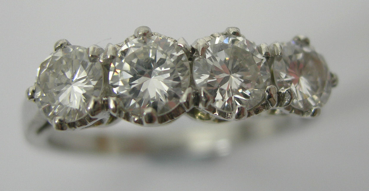A diamond four-stone ring,