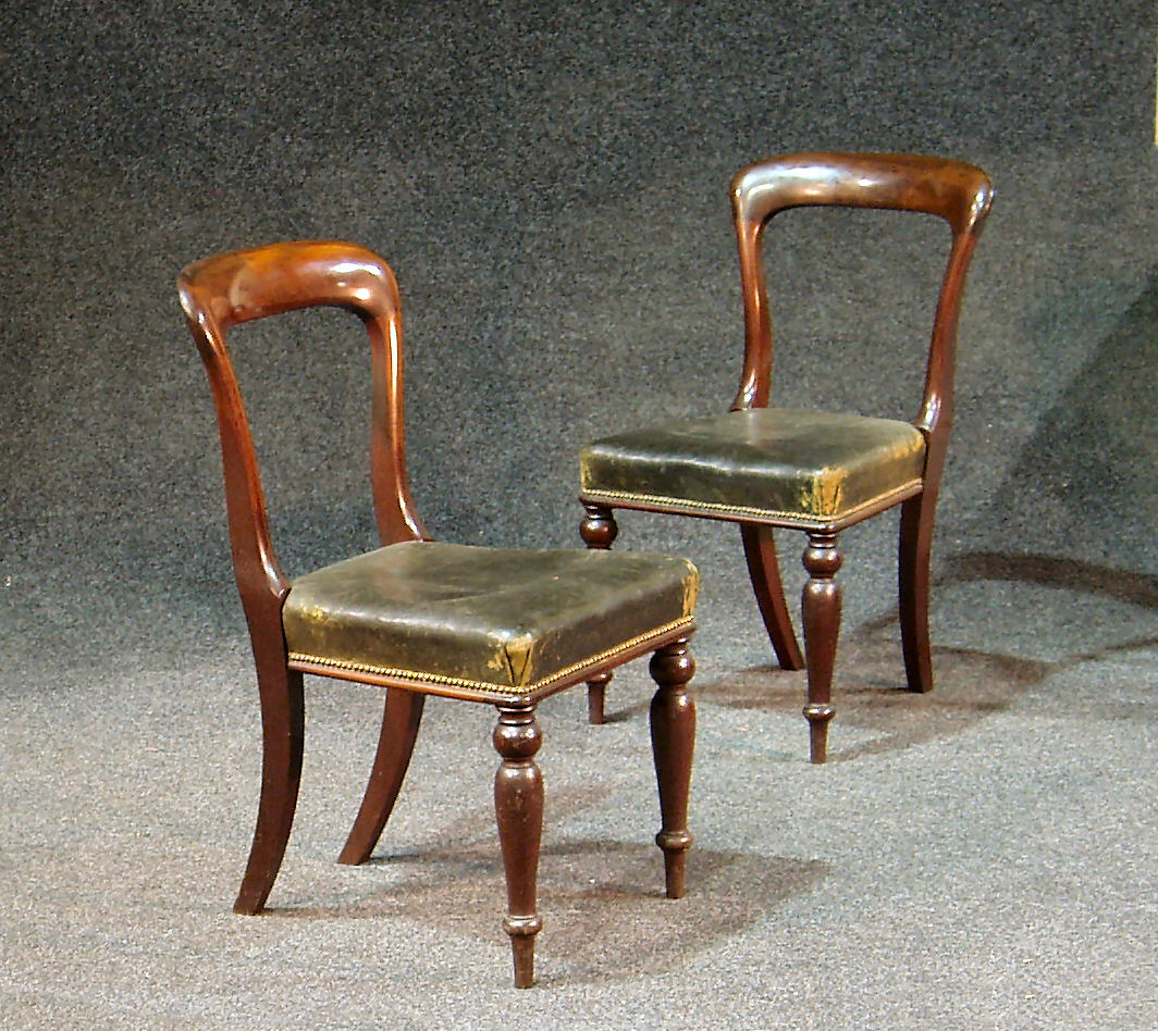A set of six late Victorian mahogany open back dining chairs