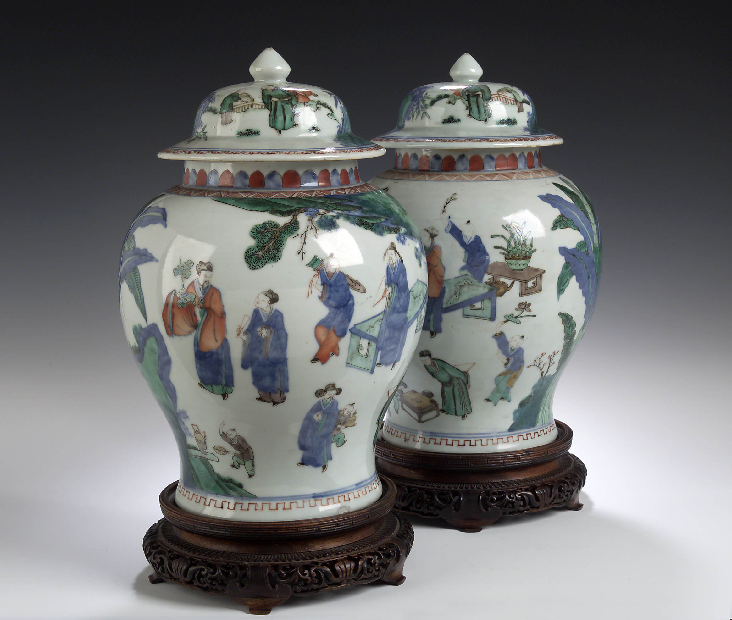 A pair of early 19th century Chinese globular vases and covers