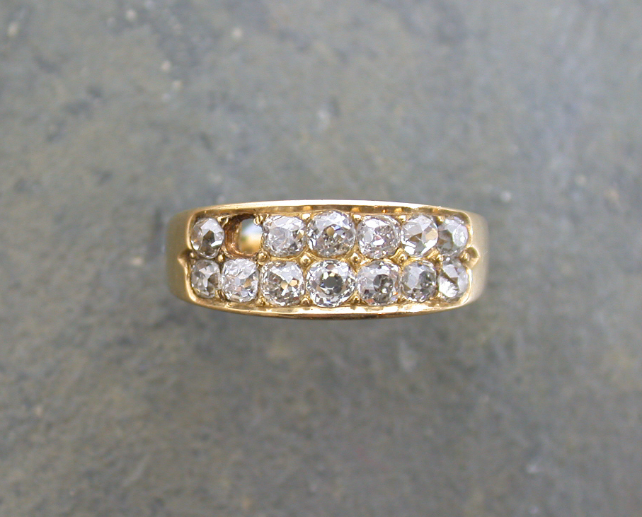 An 18ct gold mounted diamond ring,