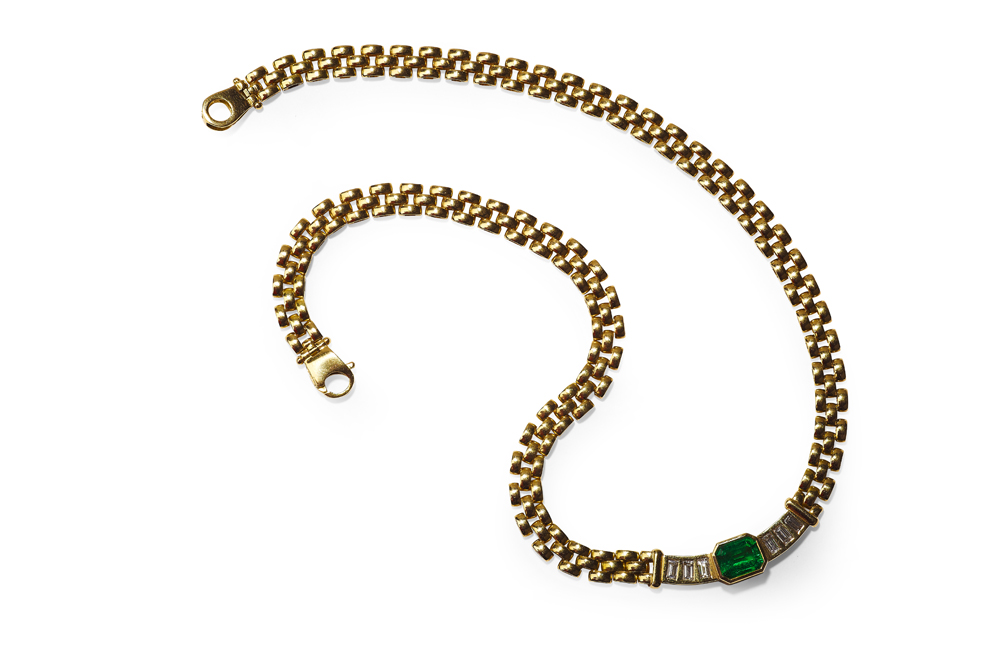A modern emerald and diamond set necklace