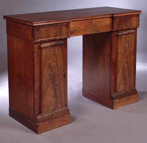 A Regency mahogany dwarf pedestal sideboard
