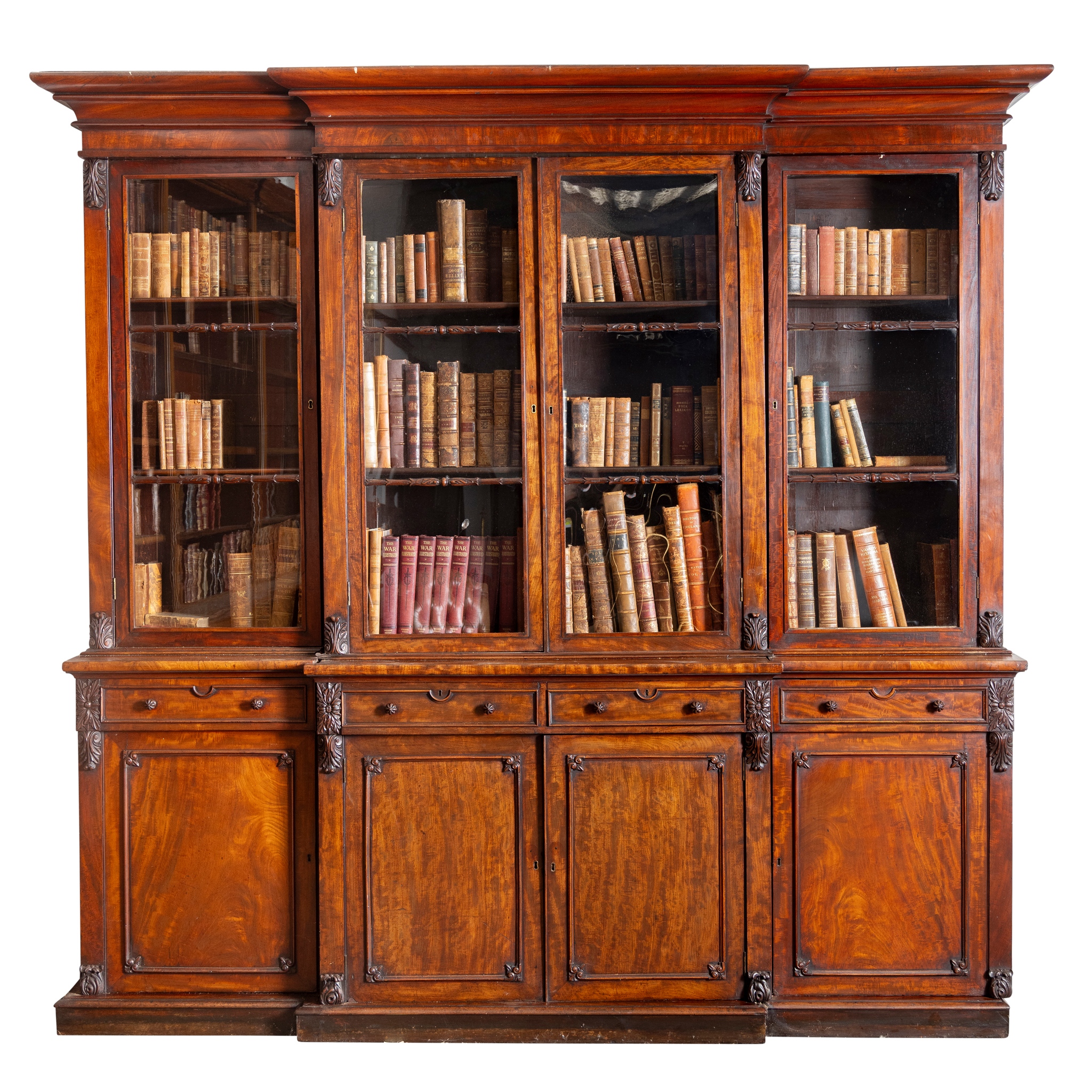 AN EARLY VICTORIAN MAHOGANY BREAKFRONT BOOKCASE