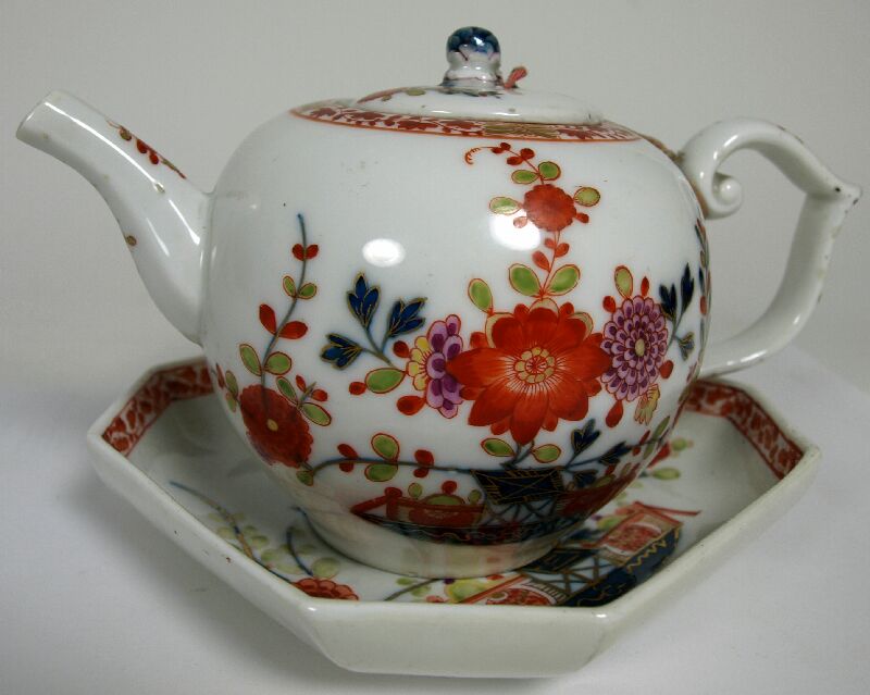 An 18th century Meissen teapot, cover and associated stand