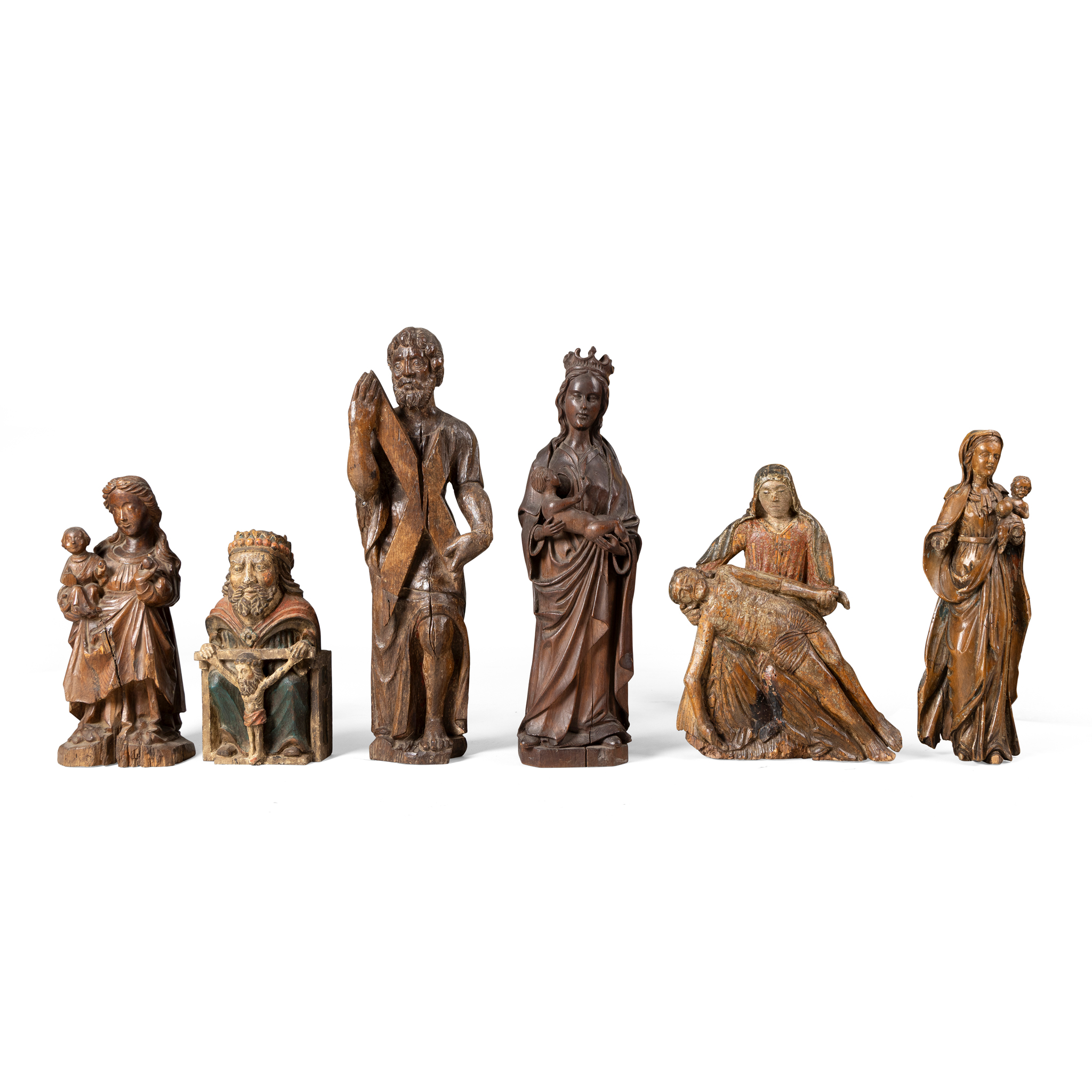 A GROUP OF SIX CARVED WOODEN FIGURES
