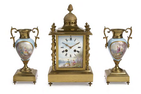 A late 19th century gilt metal clock garniture,