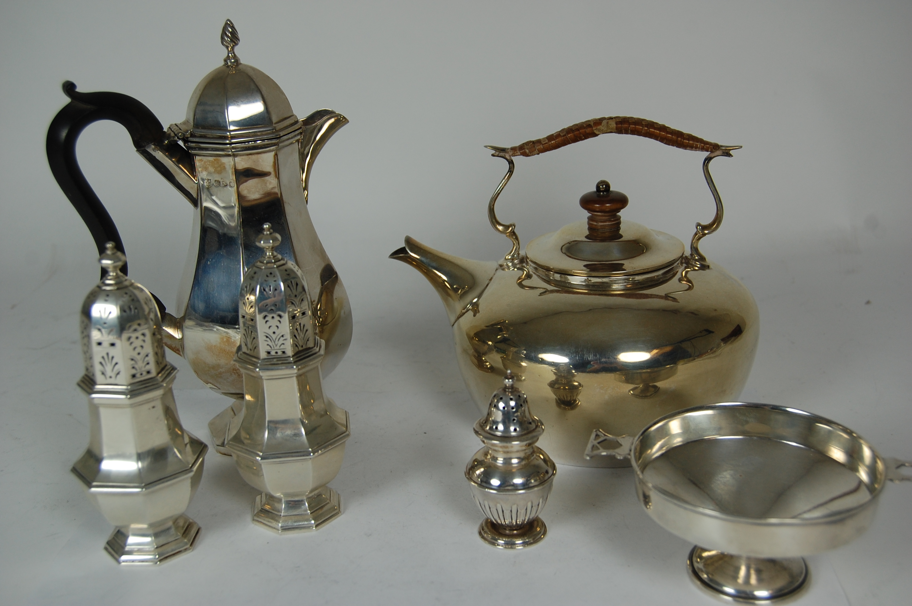 A group of modern silver