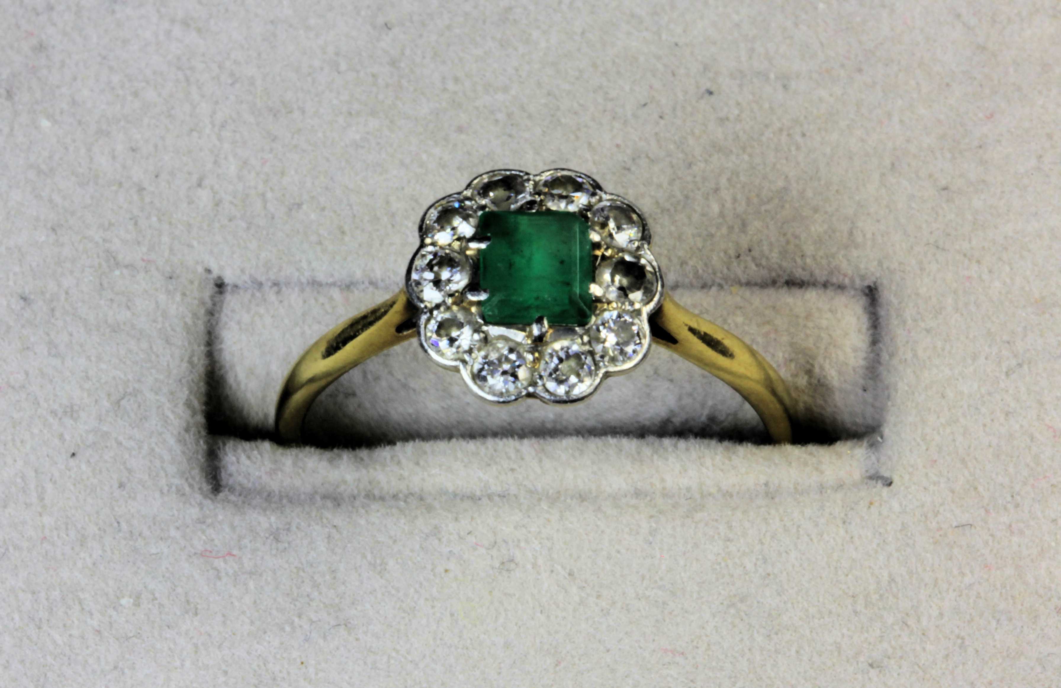 A turquoise and diamond set ring