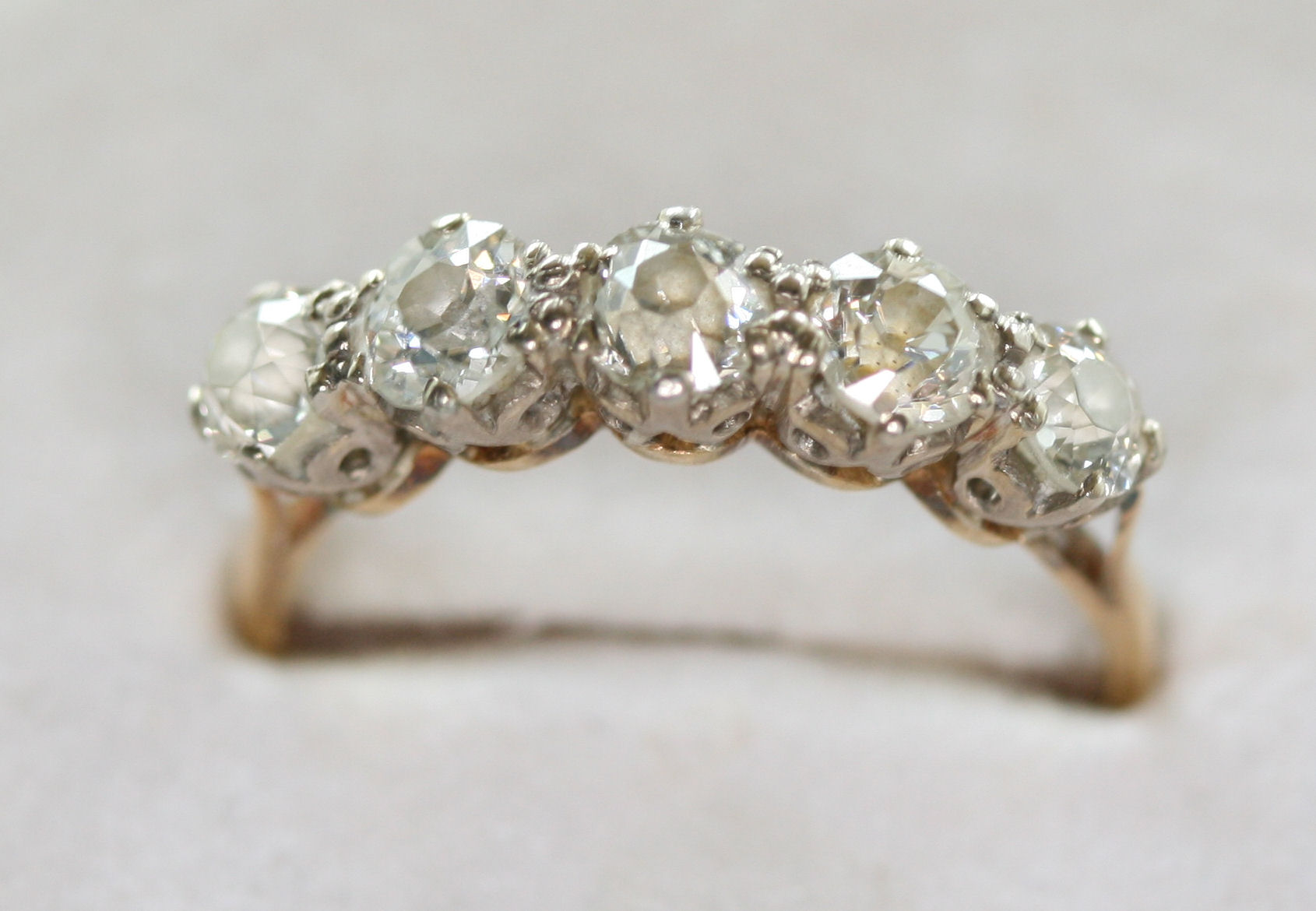 An 18ct gold mounted five-stone diamond ring