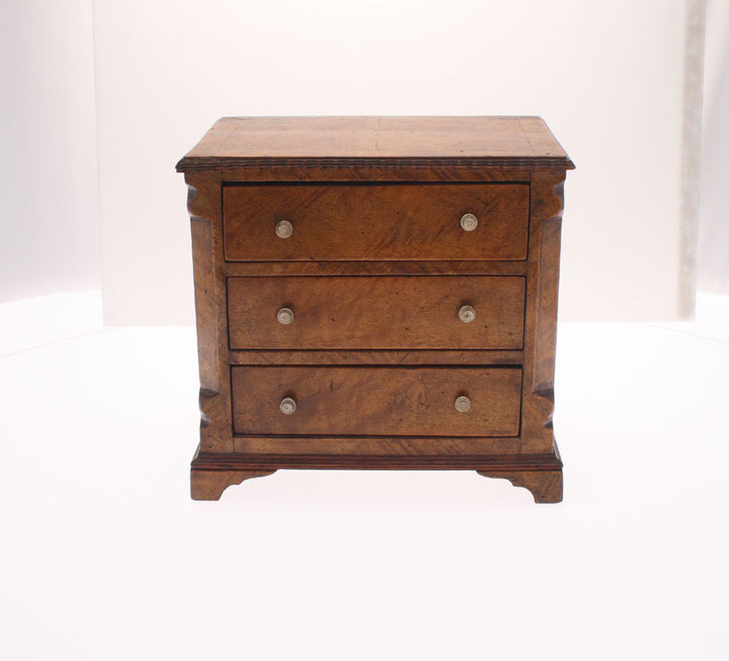 A 19th century George III walnut Apprentice chest